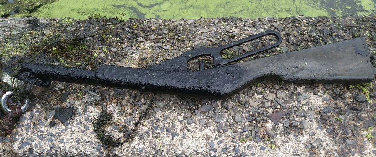 A weapon full of rust found while magnet fishing