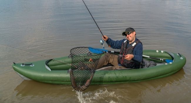 Image of a person fishing on Kayak